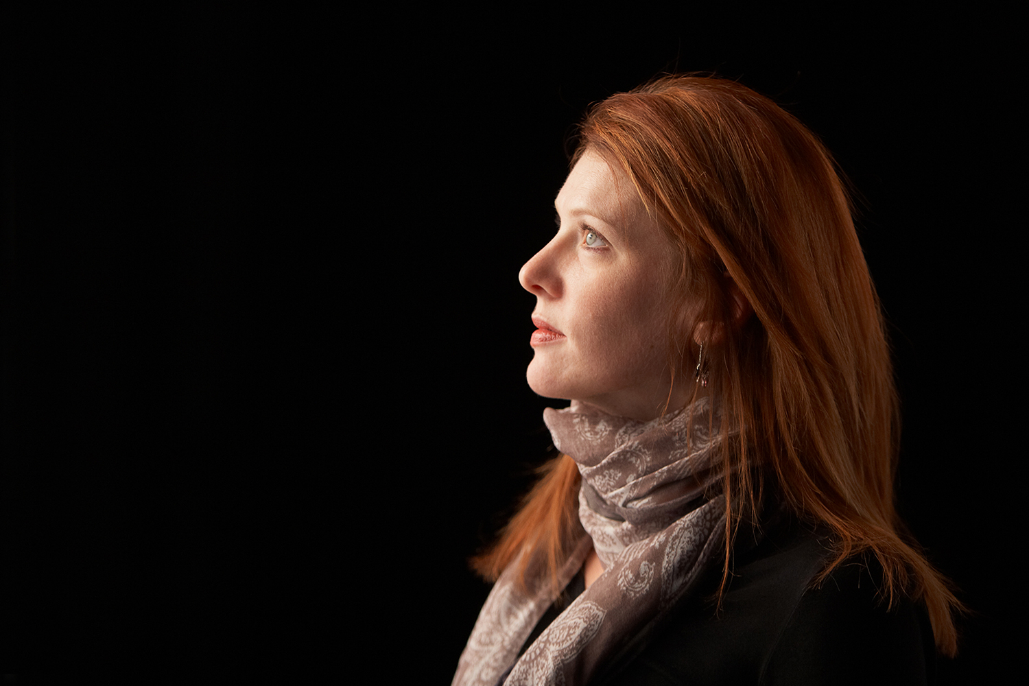 a middle-aged woman with red hair