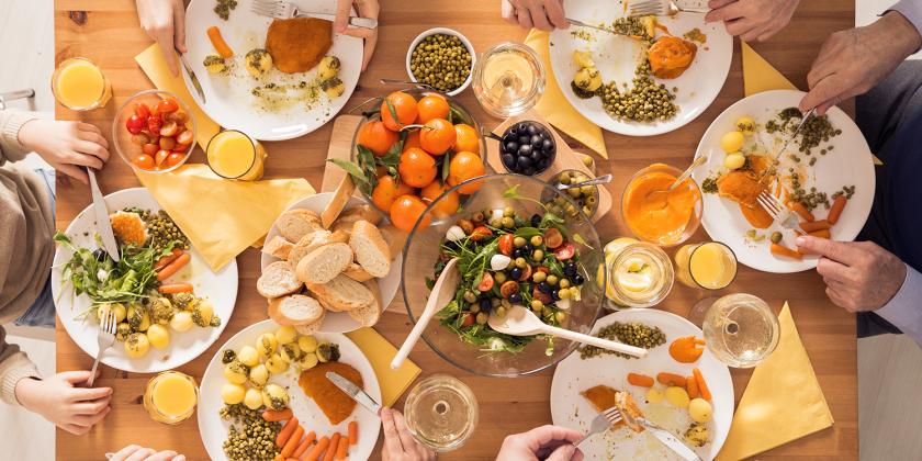 a family at the table sharing a healthy meal