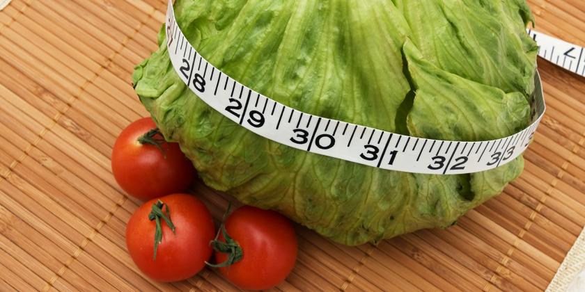 healthy foods and a tape measure for weight loss