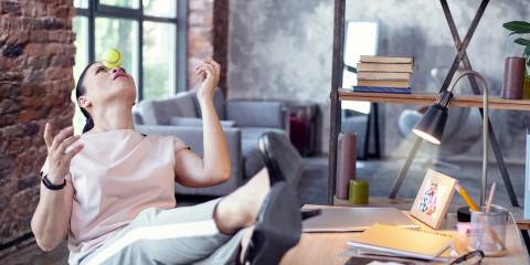 a woman trying to relax in the office