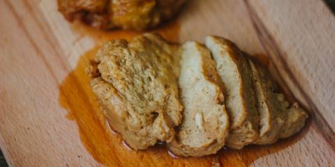 Sliced Seitan Roast on a cutting board.