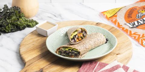 wrap sandwich on wooden cutting board