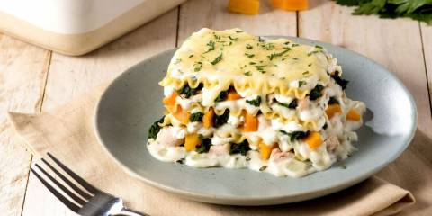 A slice of lasagna made with thanksgiving leftovers