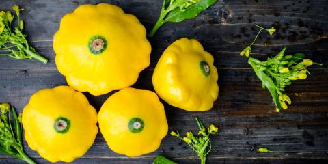 Yellow patty pan squash on a table