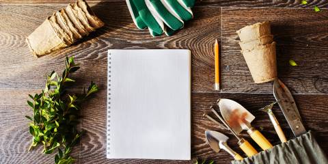 gardening tools and a notebook